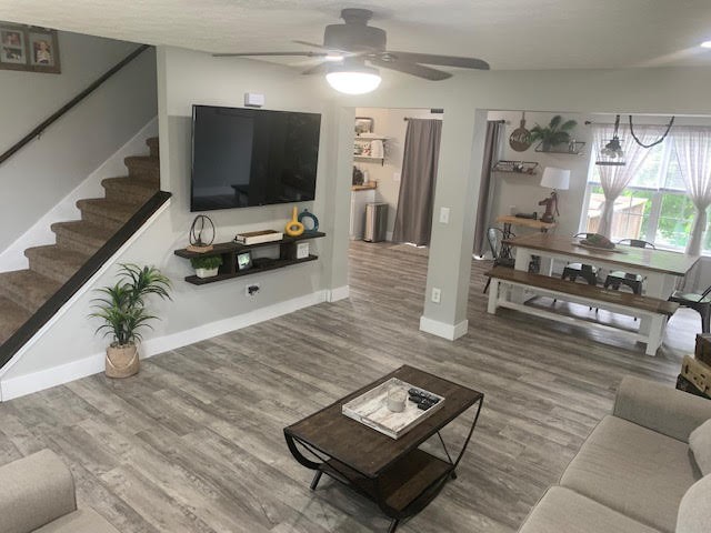 4002 Timber Ridge Court Mount Juliet, TN 37122 - Photo 5 of 37 a living room with furniture and a flat screen tv