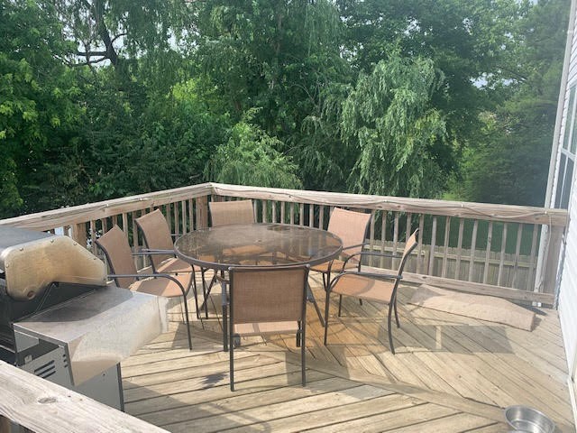 4002 Timber Ridge Court Mount Juliet, TN 37122 - Photo 8 of 37 a view of a chairs and table on the deck