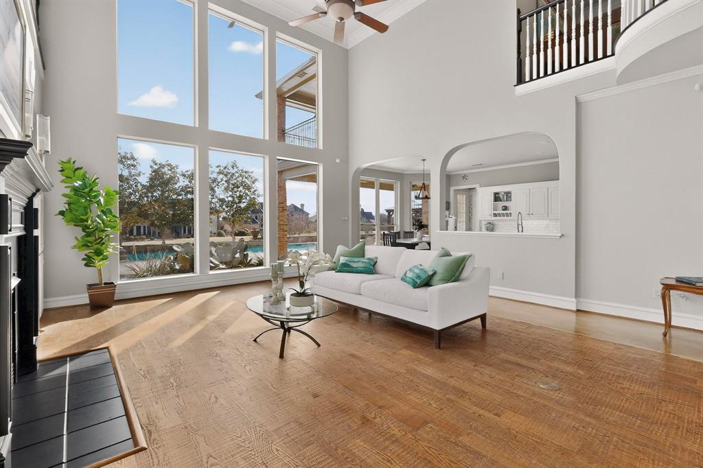 2108 Kyle Circle Heath, TX 75032 - Photo 3 of 40 Huge living room with floor to ceiling windows!