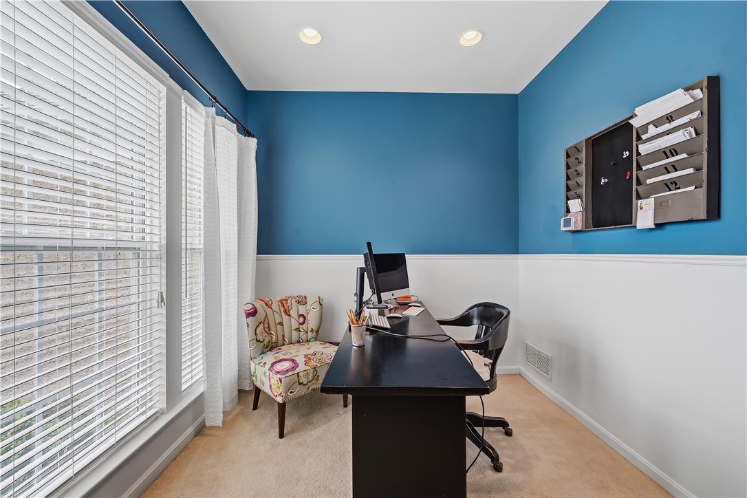 9031 Pathfinder Road Breinigsville, PA 18031 - Photo 28 of 63 An inviting study, perfect for productivity, features recessed lighting and ample natural illumination from large windows.