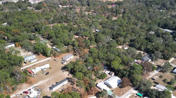 an aerial view of a city with lots of residential buildings