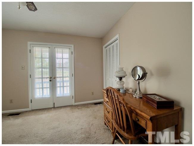 908 Orange Factory Road Bahama, NC 27503 - Photo 17 of 23 a view of a room with a window