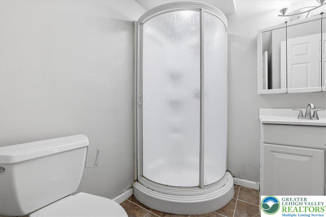612 Mountain View Way Bushkill, PA 18324 - Photo 14 of 31 a bathroom with a toilet and a sink