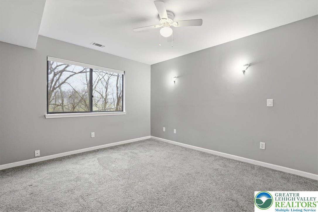 612 Mountain View Way Bushkill, PA 18324 - Photo 15 of 31 wooden floor in an empty room with a window