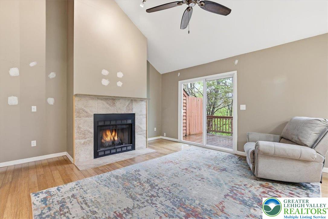 612 Mountain View Way Bushkill, PA 18324 - Photo 2 of 31 a living room with furniture and a fireplace