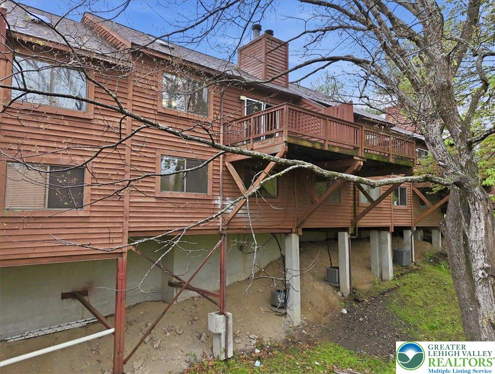 612 Mountain View Way Bushkill, PA 18324 - Photo 21 of 31 a front view of a house with a yard