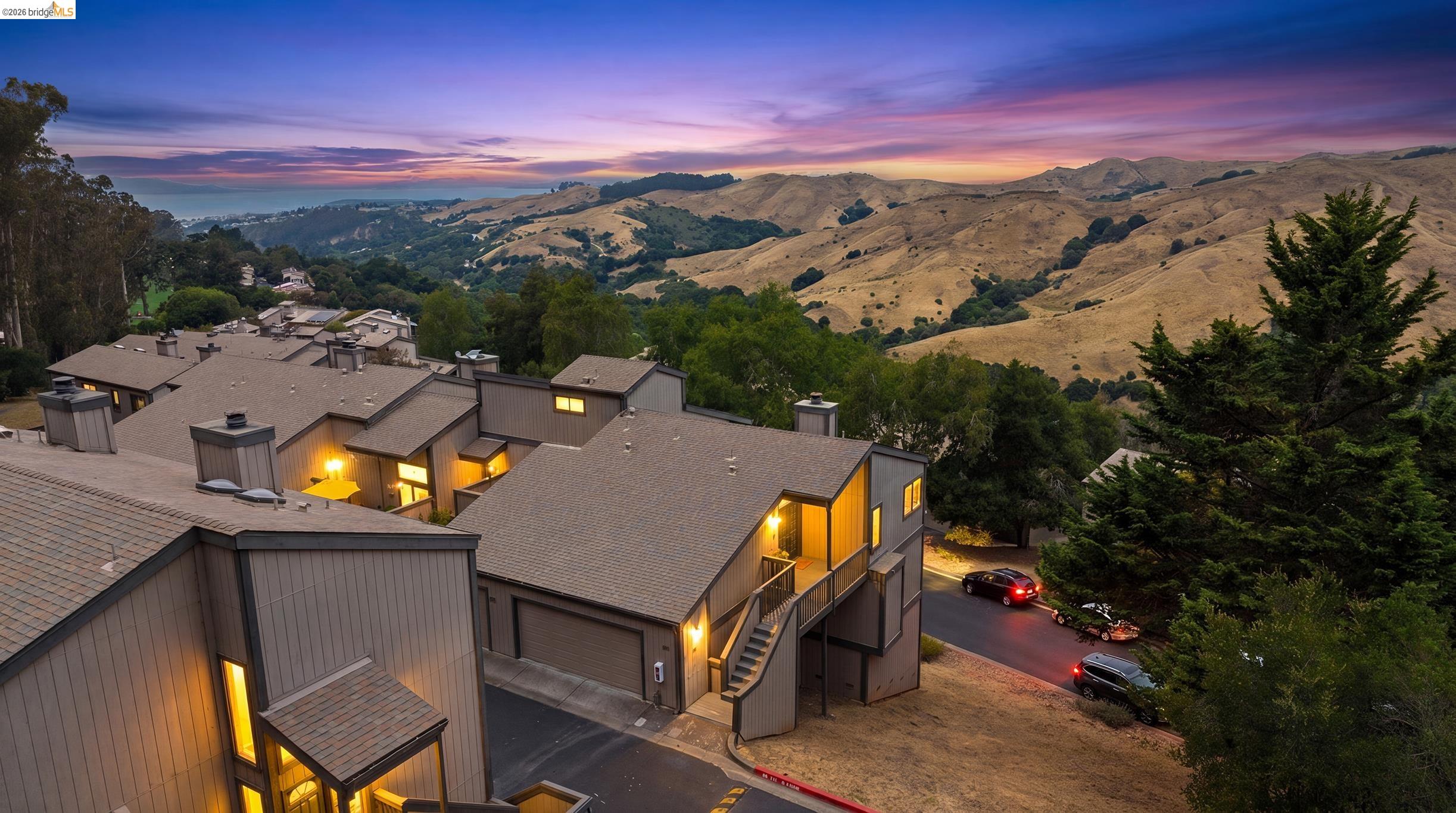 Modern multi-level architecture with sloped roofs and multiple windows