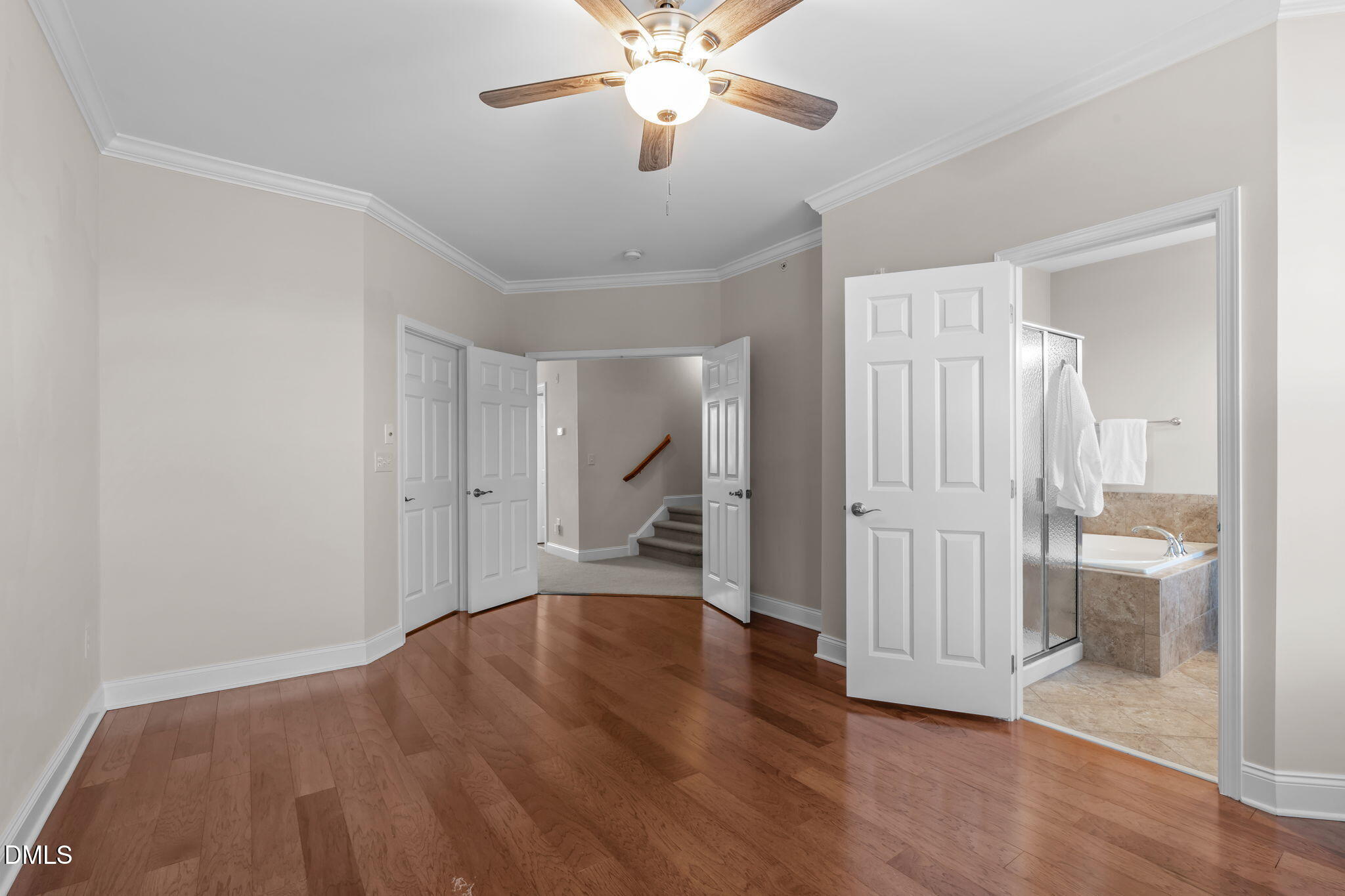 10410 Sablewood Drive, Unit 109 Raleigh, NC 27617 - Photo 17 of 42 a view of empty room with wooden floor