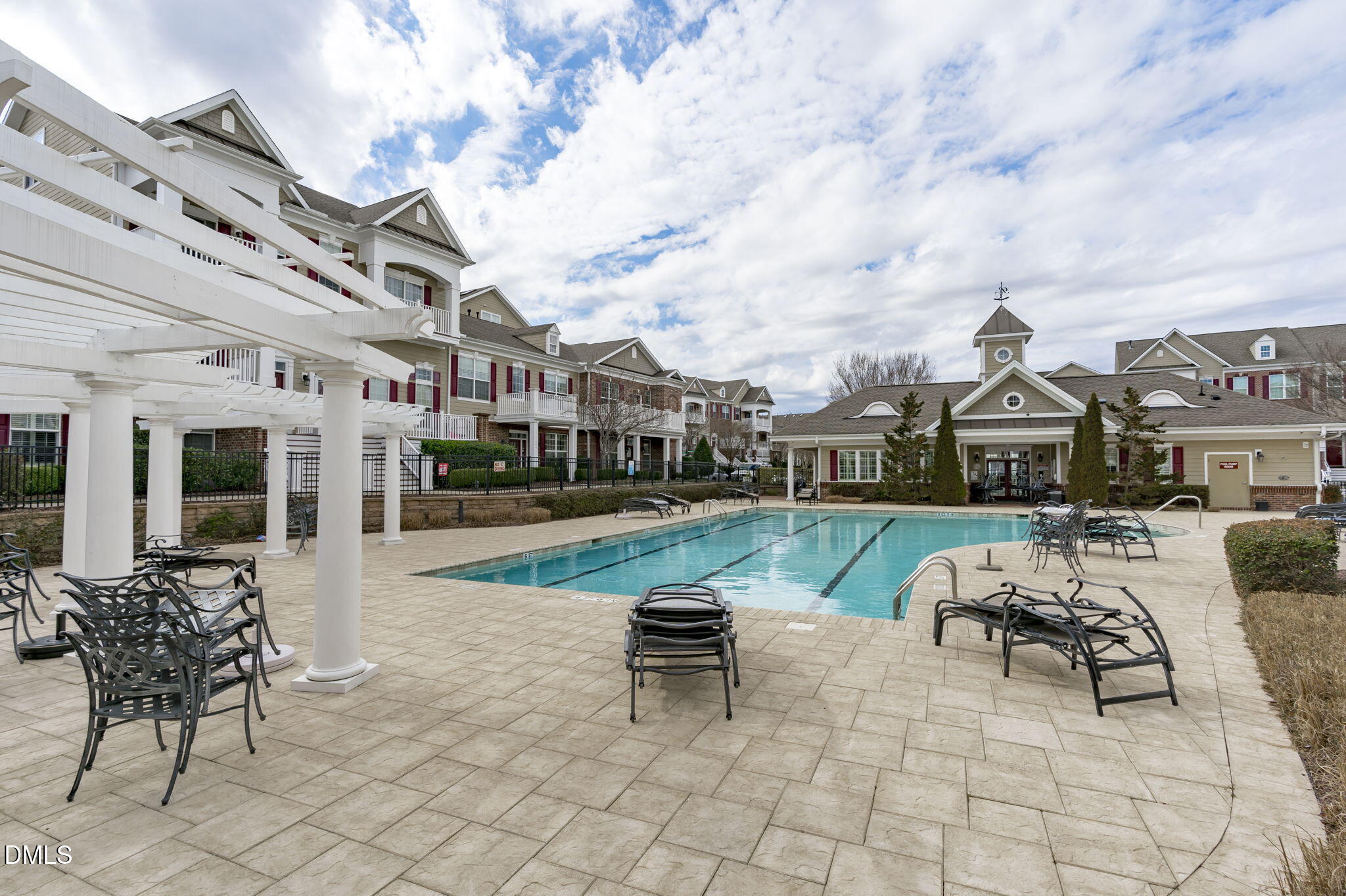 10410 Sablewood Drive, Unit 109 Raleigh, NC 27617 - Photo 34 of 42 a swimming pool with outdoor seating and barbeque oven