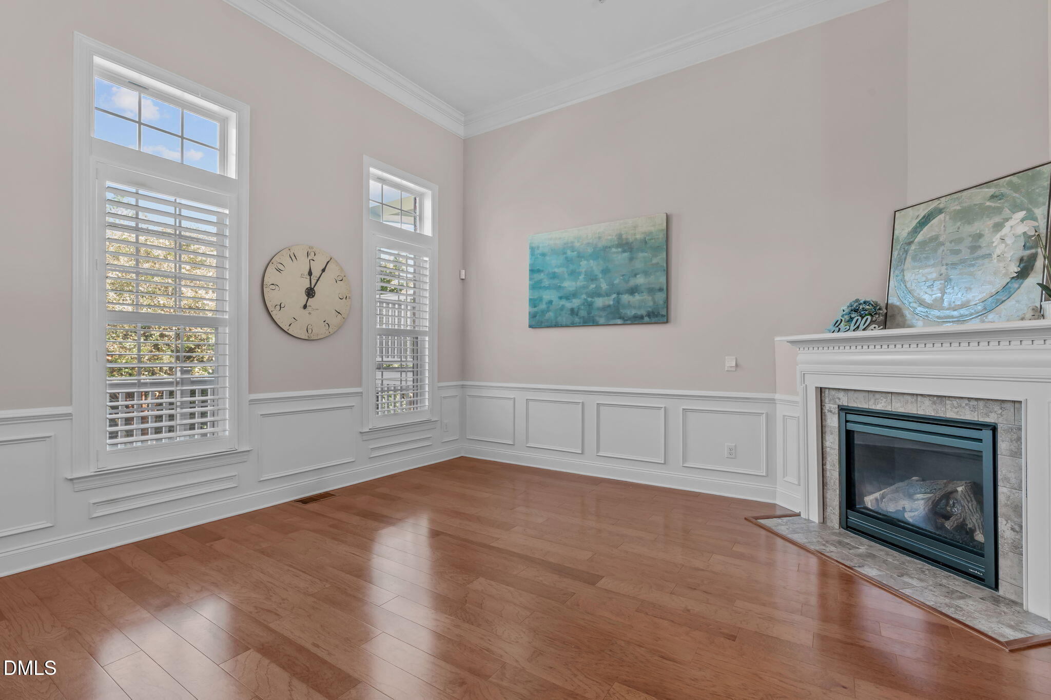 10410 Sablewood Drive, Unit 109 Raleigh, NC 27617 - Photo 5 of 42 a view of a livingroom with an empty space and a fireplace