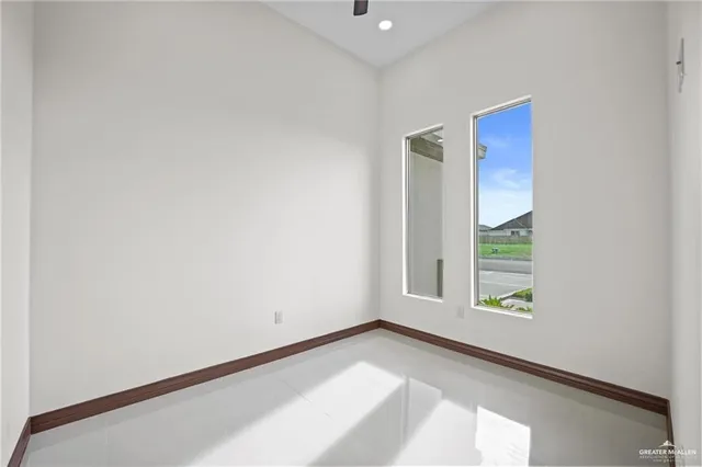 a view of an empty room and window