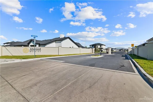 a view of a swimming pool with an outdoor seating