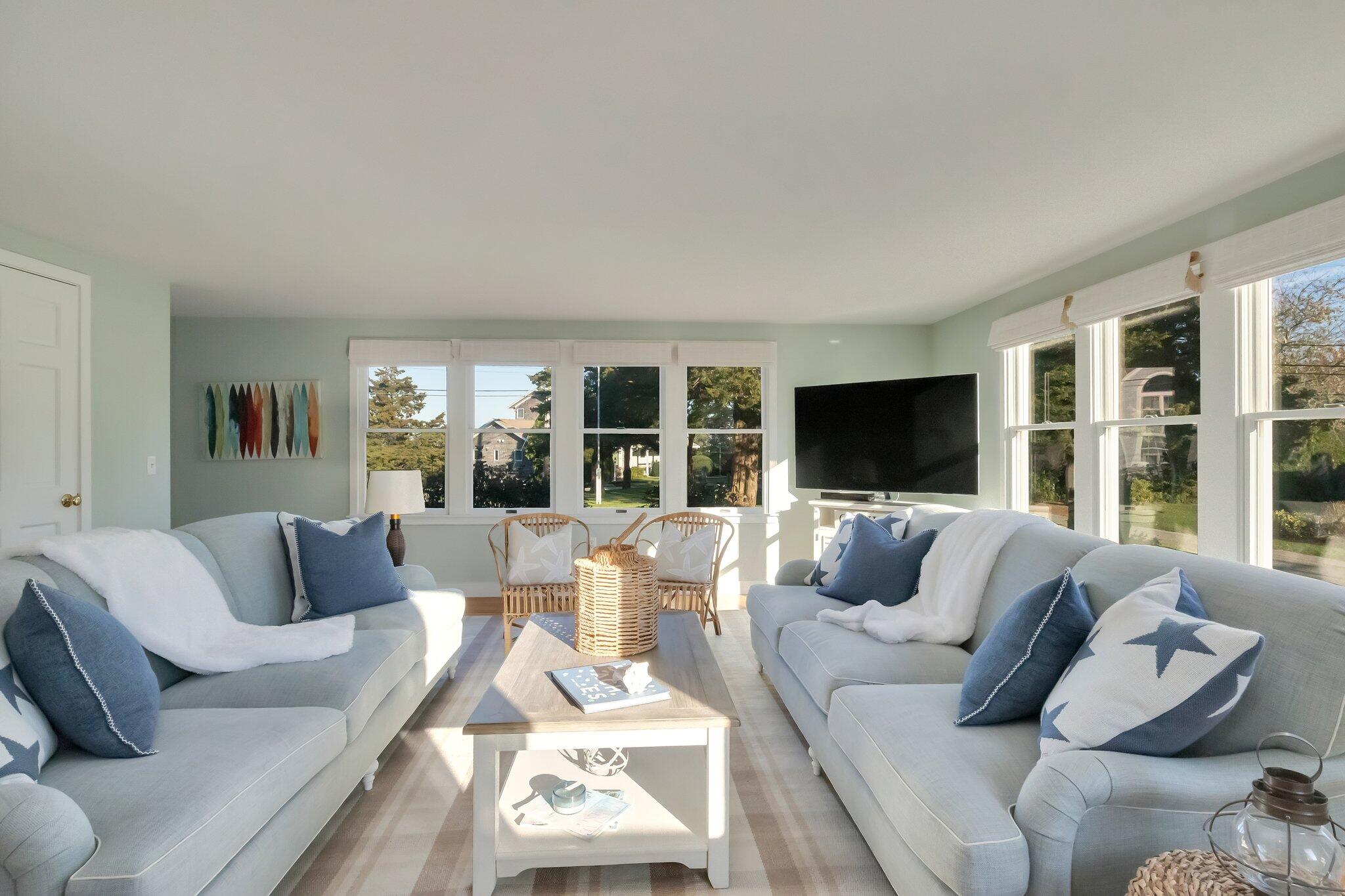 35 Mill Pond Road Orleans, MA 02653 - Photo 8 of 34 a living room with furniture and a flat screen tv