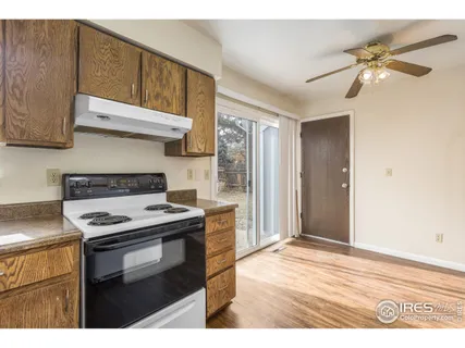 a kitchen with a stove and a microwave