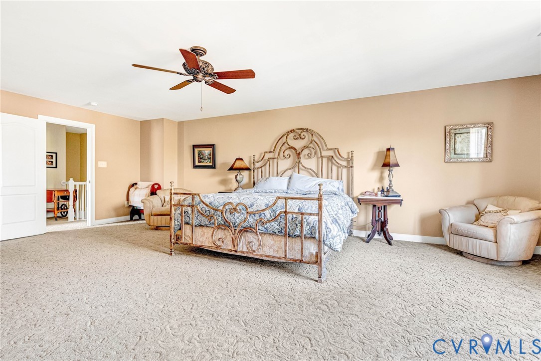 5221 Preston Square Loop Glen Allen, VA 23059 - Photo 18 of 30 a bedroom with furniture and white walls
