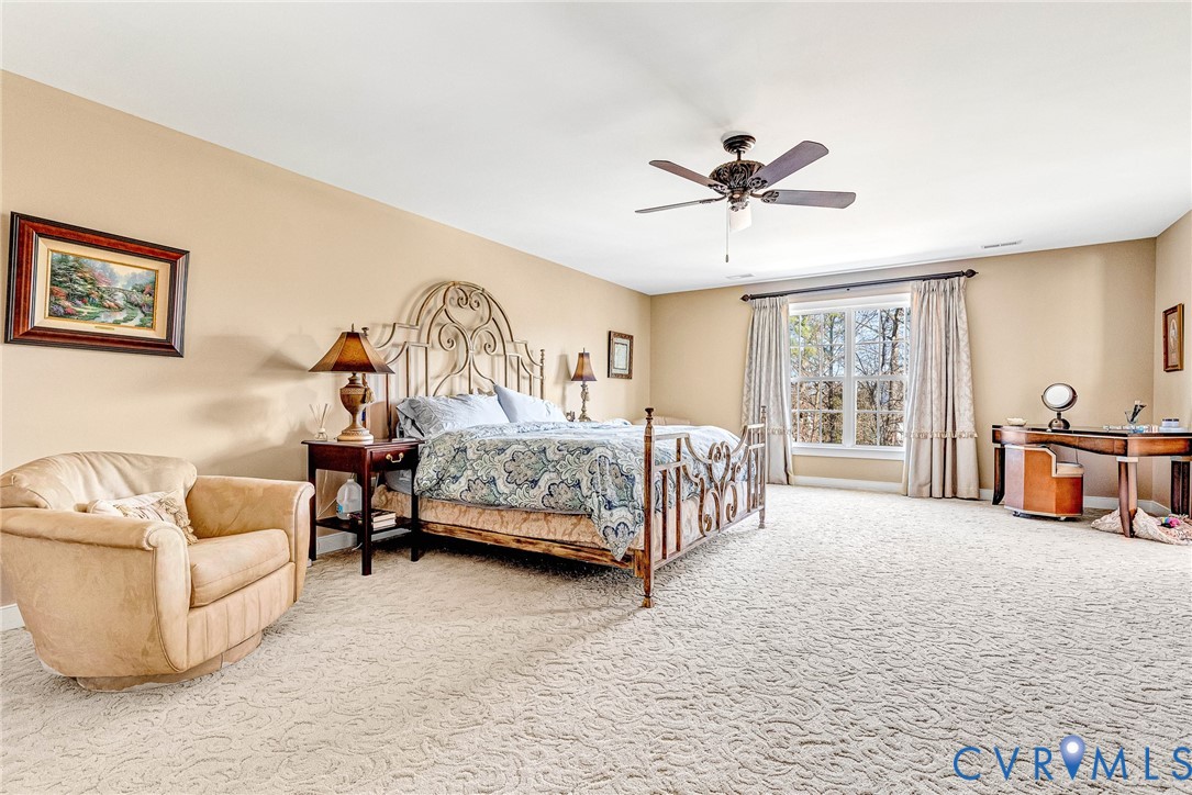 5221 Preston Square Loop Glen Allen, VA 23059 - Photo 19 of 30 a bedroom with furniture and a large window