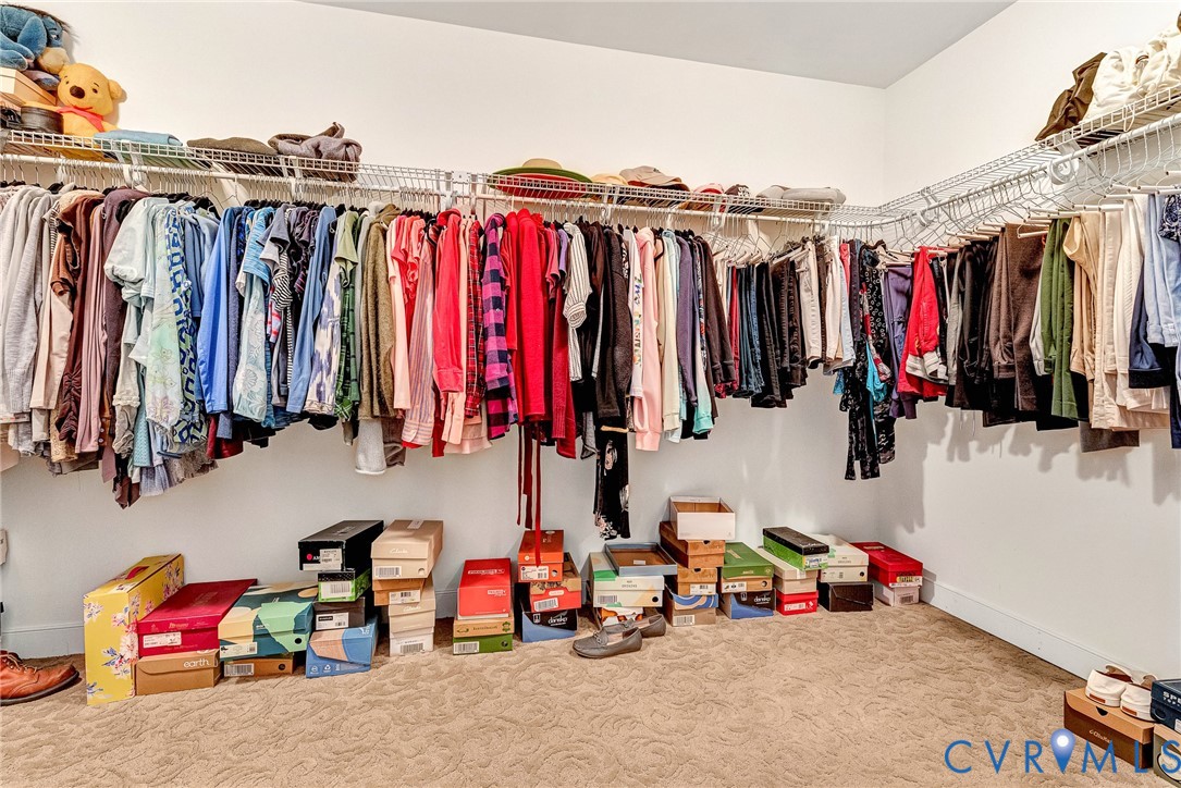 5221 Preston Square Loop Glen Allen, VA 23059 - Photo 23 of 30 a view of walk in closet with clothes and shoes