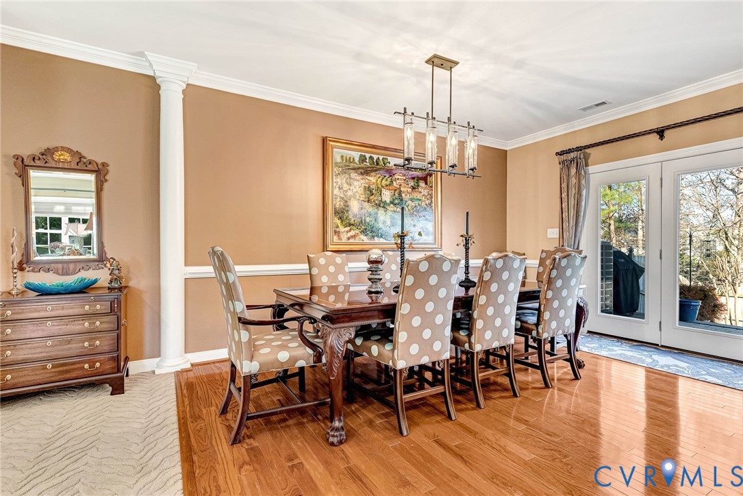 5221 Preston Square Loop Glen Allen, VA 23059 - Photo 6 of 30 a view of a dining room with furniture window and wooden floor