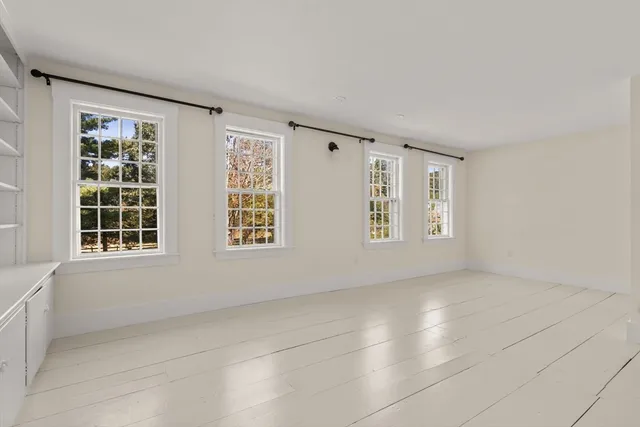 an empty room with windows