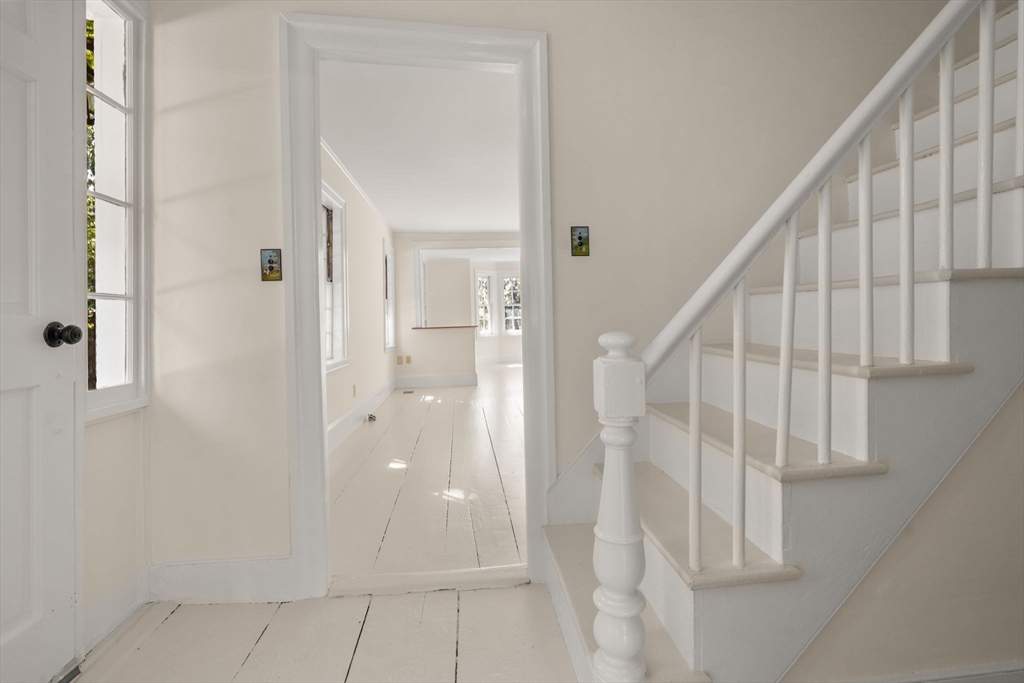 1011 Edmands Road Framingham, MA 01701 - Photo 6 of 36 a view of entryway with wooden floor