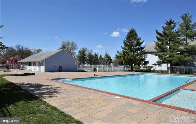 a view of a house with swimming pool
