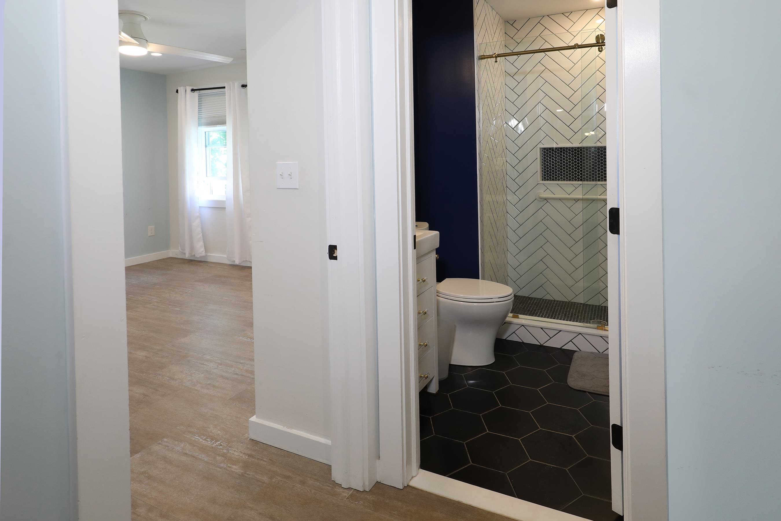 21 Beverly Road Cape May, NJ 08204 - Photo 18 of 38 a bathroom with a toilet and a shower
