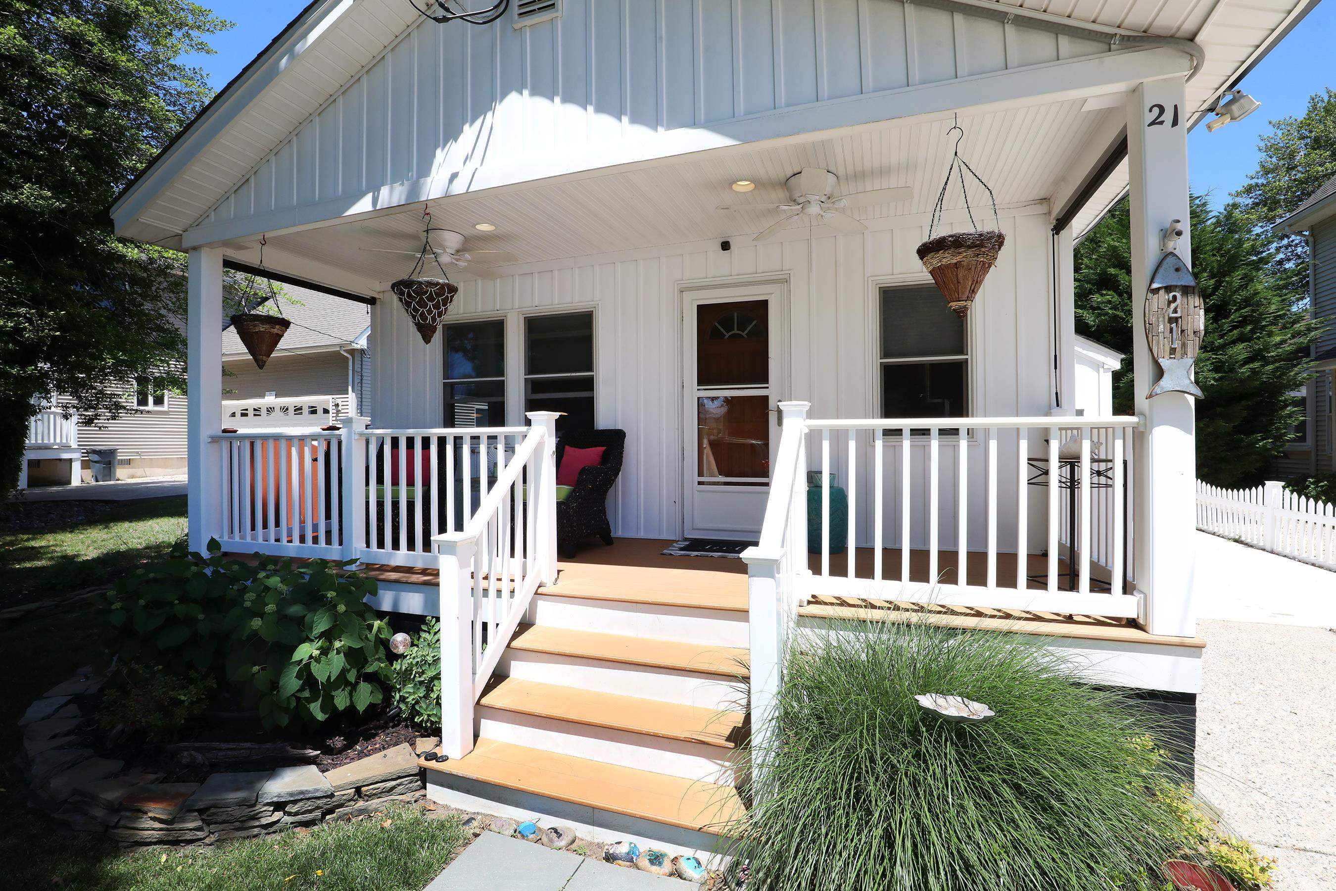 21 Beverly Road Cape May, NJ 08204 - Photo 2 of 38 a view of a house with backyard and porch