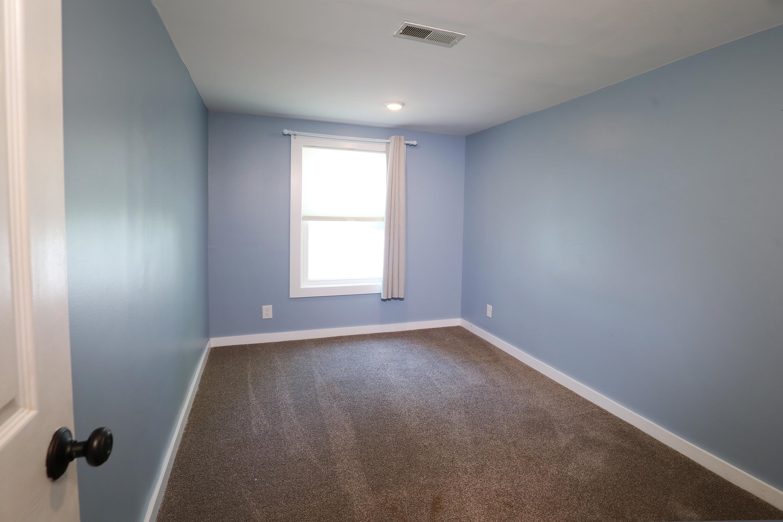 21 Beverly Road Cape May, NJ 08204 - Photo 32 of 38 an empty room with a window