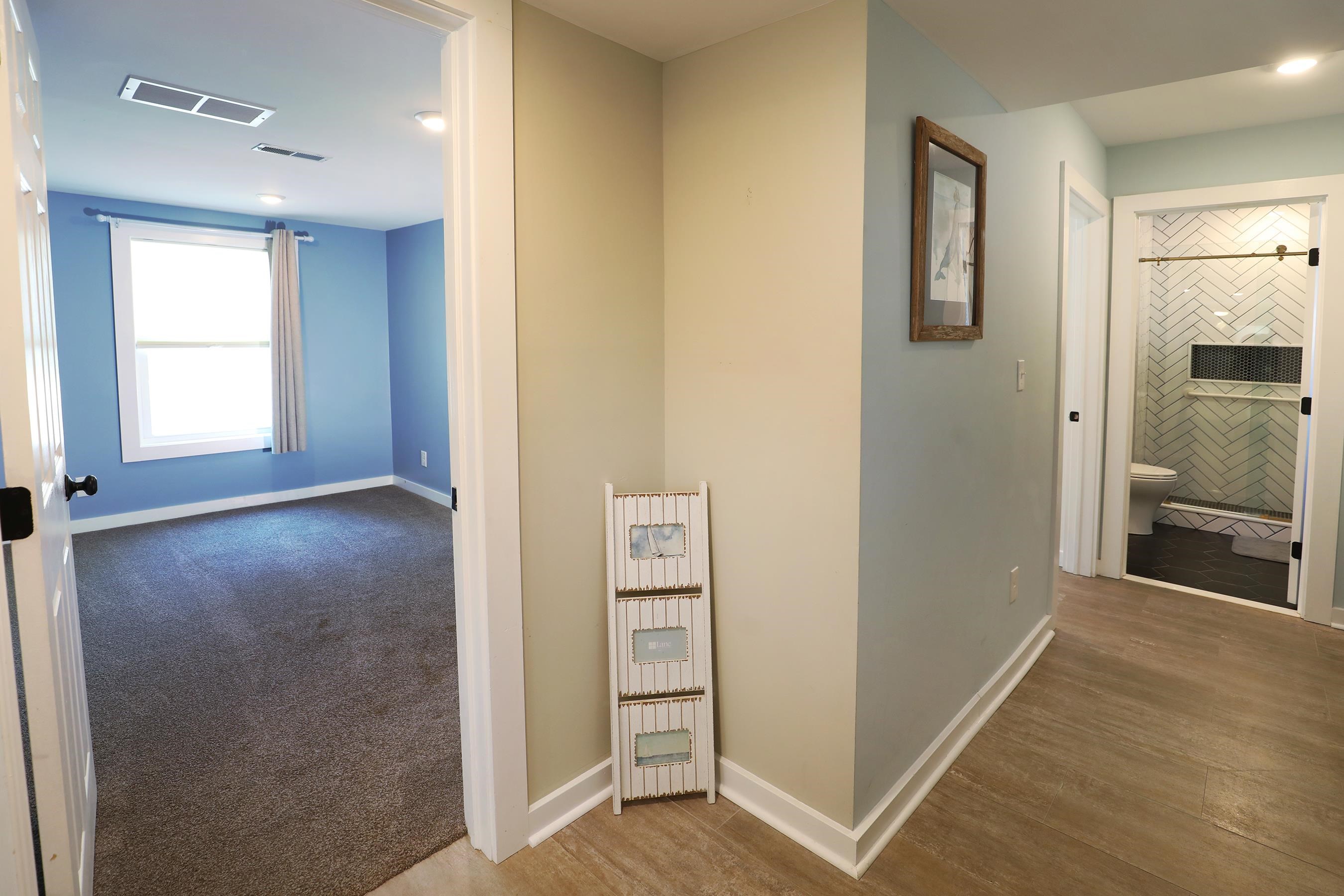 21 Beverly Road Cape May, NJ 08204 - Photo 33 of 38 a view of livingroom with hardwood floor and a bathroom