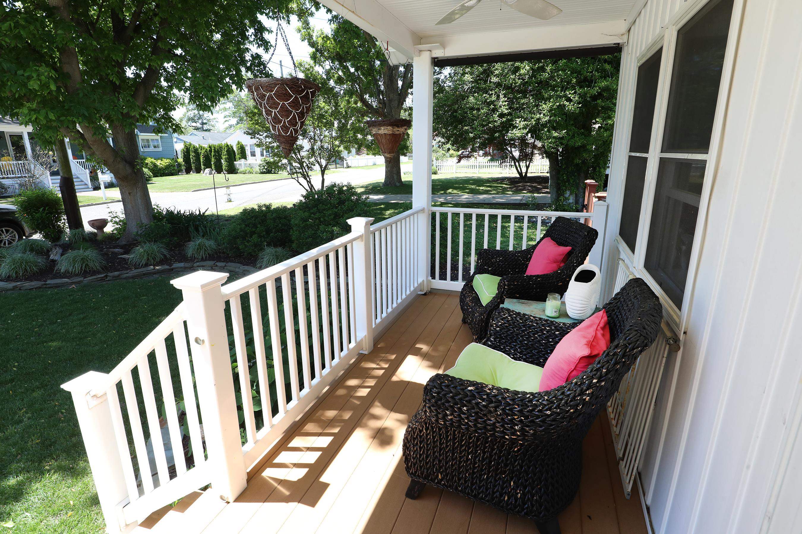 21 Beverly Road Cape May, NJ 08204 - Photo 9 of 38 a view of a porch with furniture and garden