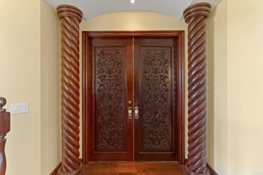 20895 Viento Valle Escondido, CA 92025 - Photo 24 of 75 Exotic wood carved doors throughout house