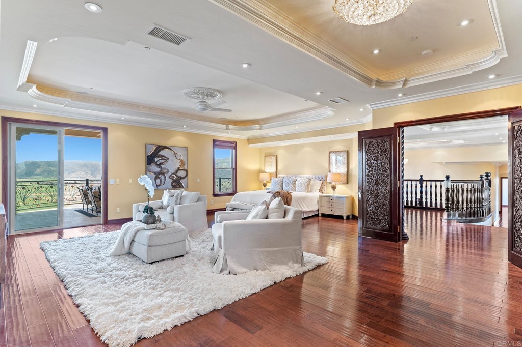 20895 Viento Valle Escondido, CA 92025 - Photo 27 of 75 a living room with furniture and a wooden floor