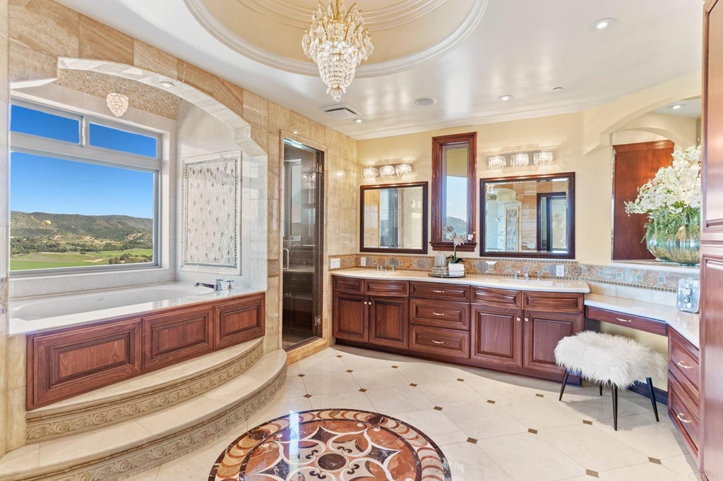 20895 Viento Valle Escondido, CA 92025 - Photo 35 of 75 a large bathroom with a large tub sink and window
