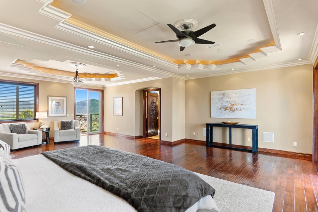 20895 Viento Valle Escondido, CA 92025 - Photo 41 of 75 a living room with furniture and a wooden floor