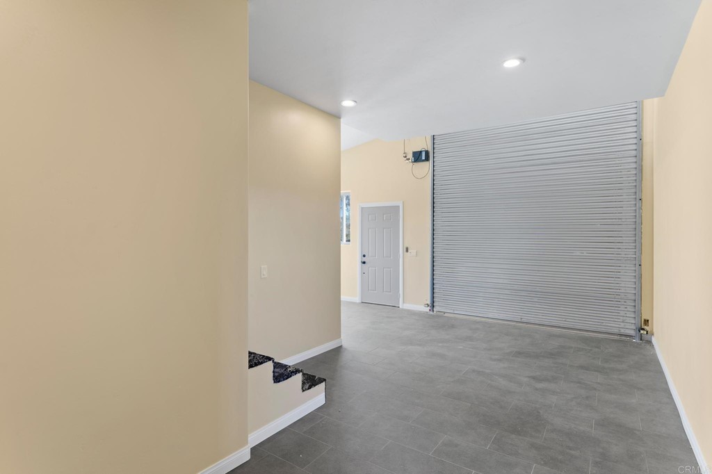 20895 Viento Valle Escondido, CA 92025 - Photo 72 of 75 an empty room with a hallway