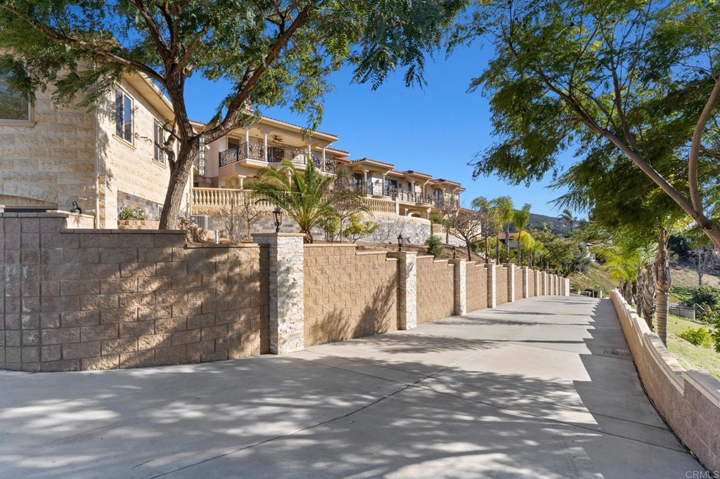 20895 Viento Valle Escondido, CA 92025 - Photo 73 of 75 a front view of a house with a tree