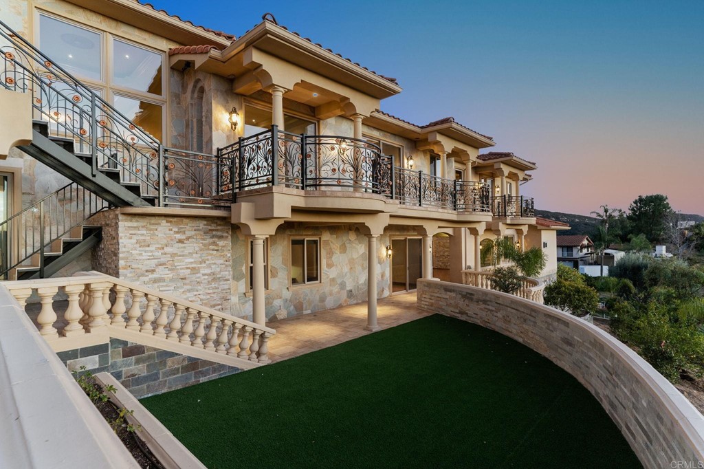 20895 Viento Valle Escondido, CA 92025 - Photo 75 of 75 a view of a white house with iron fence