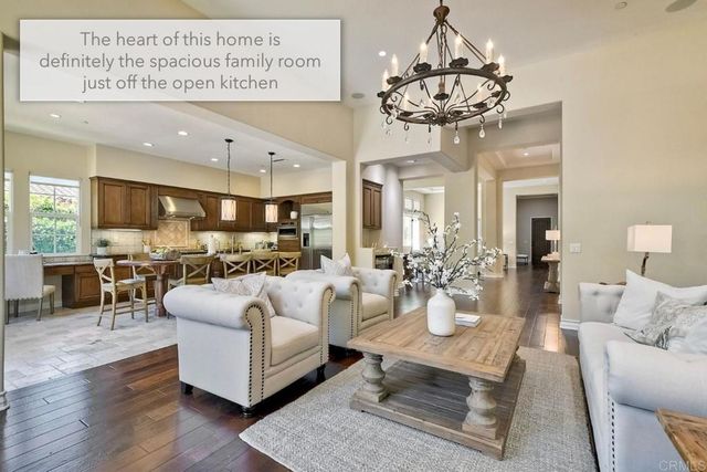 a spacious bathroom with a sink a mirror and a shower