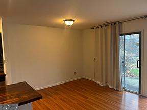 12 Pine Woods Court Reading, PA 19607 - Photo 7 of 10 a view of a room with wooden floor and small window
