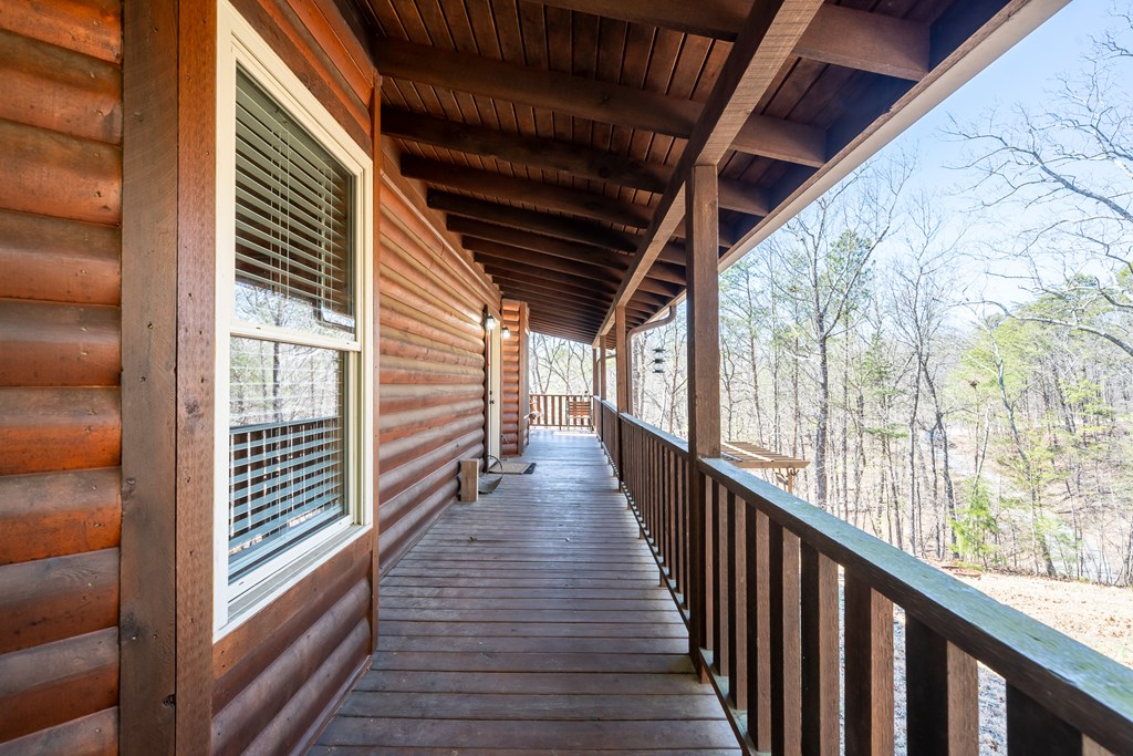1529 Faith Court Ranger, GA 30734 - Photo 14 of 50 a view of a balcony with wooden floor