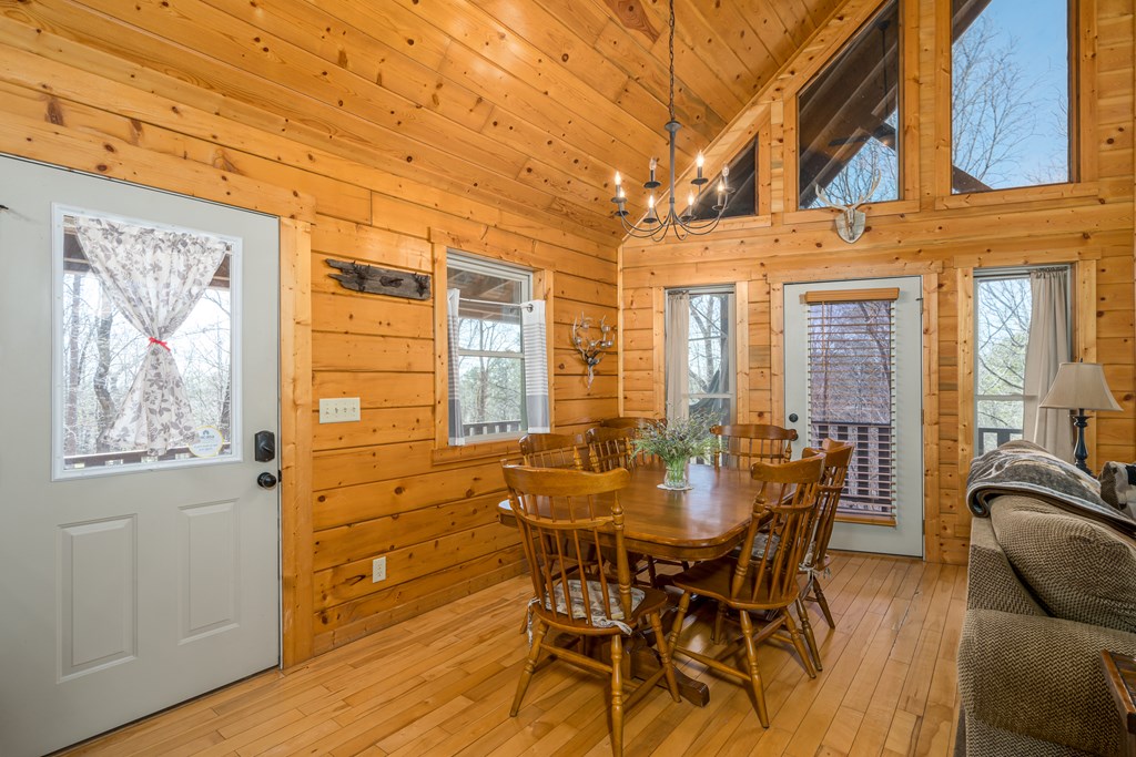 1529 Faith Court Ranger, GA 30734 - Photo 16 of 50 a view of a dining room with furniture and wooden floor