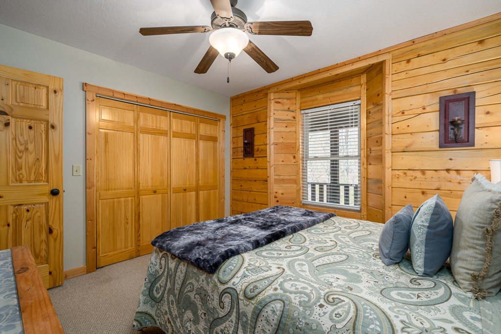 1529 Faith Court Ranger, GA 30734 - Photo 26 of 50 a bedroom with a bed and wooden floor