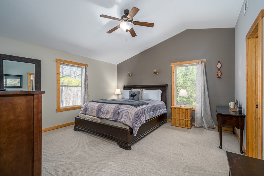 1529 Faith Court Ranger, GA 30734 - Photo 30 of 50 a bedroom with a bed dresser and a window