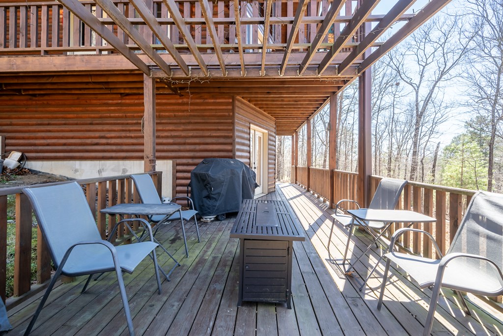 1529 Faith Court Ranger, GA 30734 - Photo 41 of 50 a view of a chairs and table on the deck