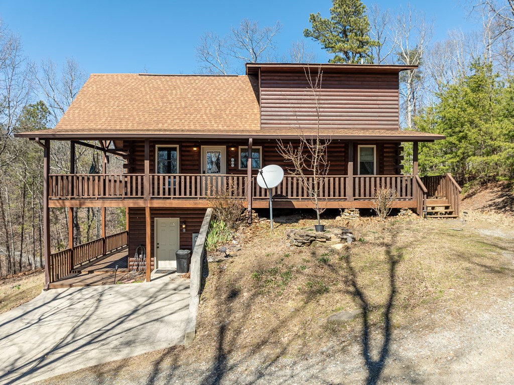1529 Faith Court Ranger, GA 30734 - Photo 5 of 50 a front view of a house with wooden deck