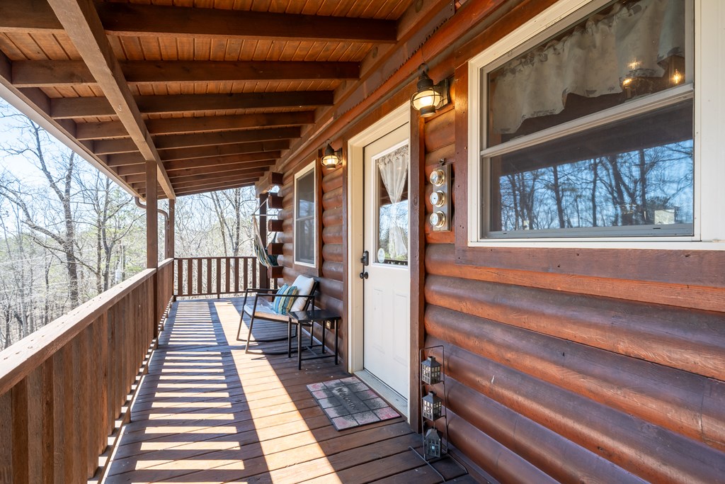 1529 Faith Court Ranger, GA 30734 - Photo 10 of 50 a view of a balcony with wooden floor