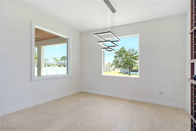 an empty room with windows