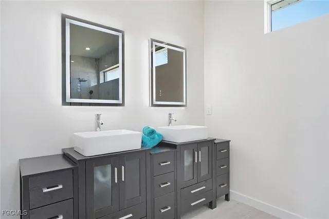 an empty room with windows and window