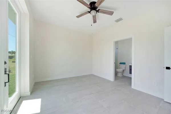 a view of a room with a window