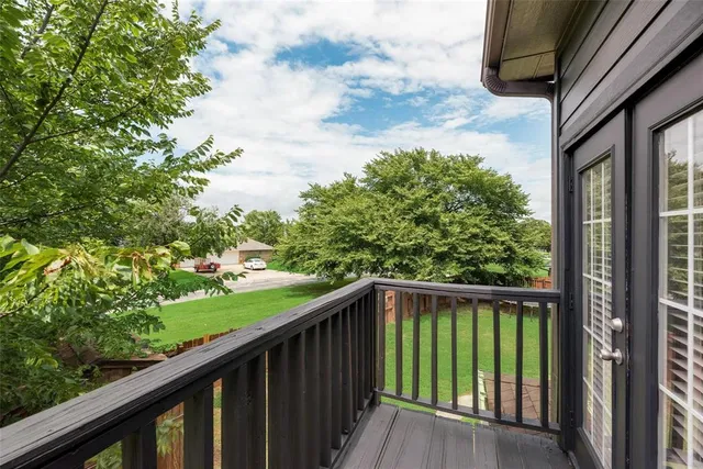 a view of a balcony with an outdoor space